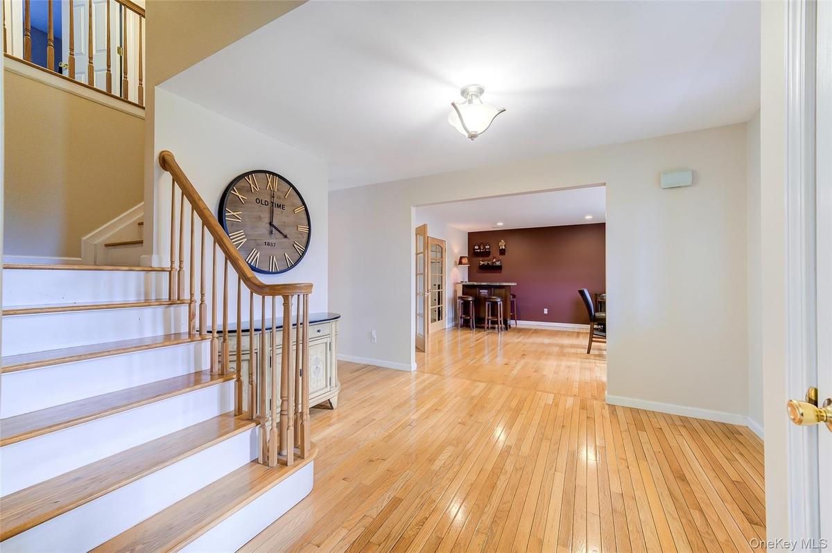 Gleaming hardwood floors throughout the first level