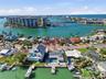Drone shot looking down at 4 Bellevue and south to The Devil's Elbow and beyond the bridge leading to the beaches and the Gulf (the intracoastal contu