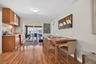Dining room with views of the pool and dry bar