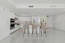 Center Island with waterfall edge quartz countertop virtually staged