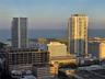 The Sun Glistens upon the City and Bay from your Private 60-foot Balcony at Sunset