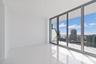 Glossy Porcelain tile runs through out