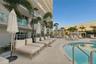 Resort Style Lounge Chairs Surround the Pool for your Relaxation