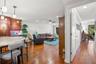 Main entry with open concept living room, kitchen, dining area