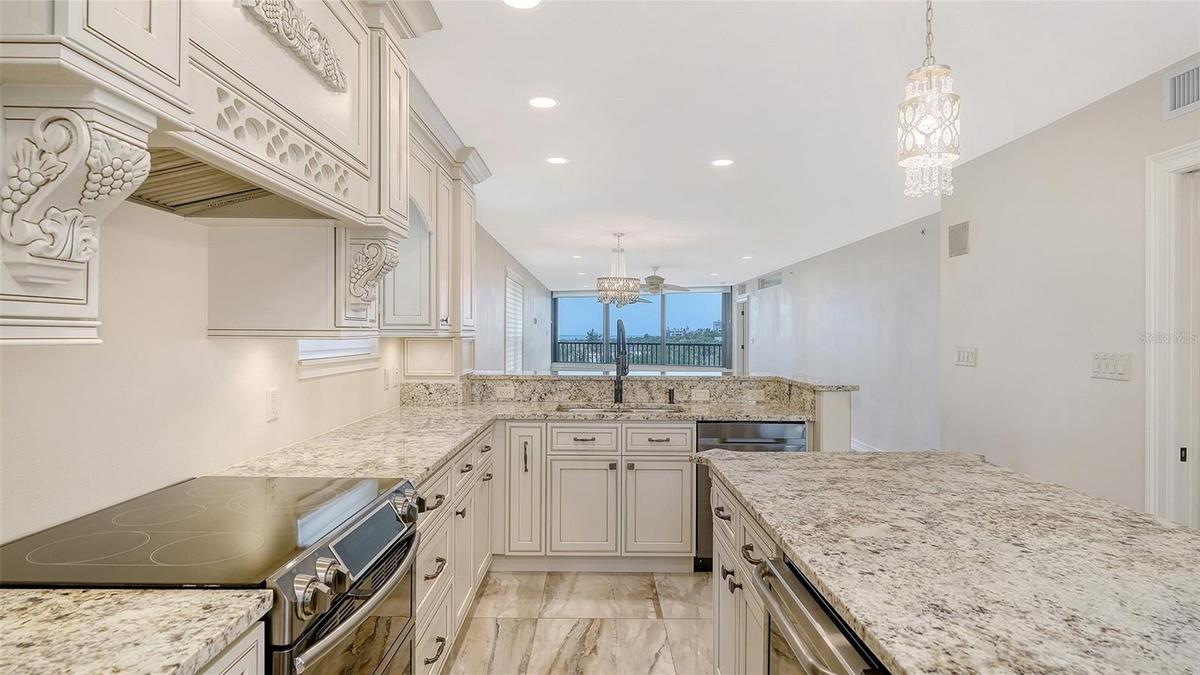 Kitchen with Beautiful Granite & Quality Custom Cabinetry
