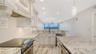 Kitchen with Beautiful Granite & Quality Custom Cabinetry