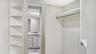 Primary Walk-In Closet with Built-Ins