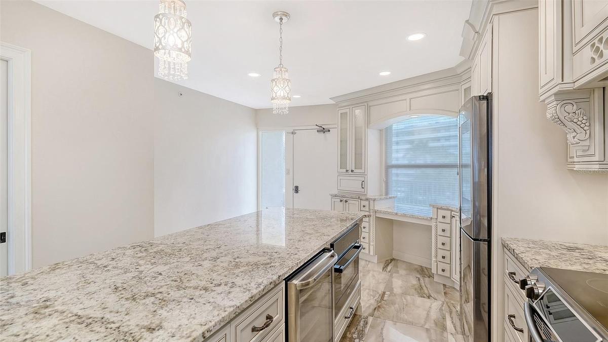 Kitchen with Beautiful Granite & Quality Custom Cabinetry