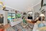 Great room with fireplace opens to lanai