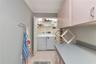 Laundry room opens to garage