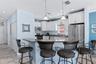 Open concept kitchen, dining and living room