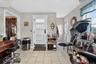 in home barber shop...can be converted to mud room. Has separate entrance.