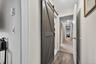 hallway from barbershop to laundry/kitchen