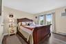 main bedroom with balcony