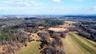 Aerial view of fields and woodland
