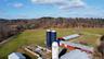 Aerial view featuring a forest view