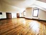 Bedroom 1 in Stone House, natural wood flooring & built-in dressers