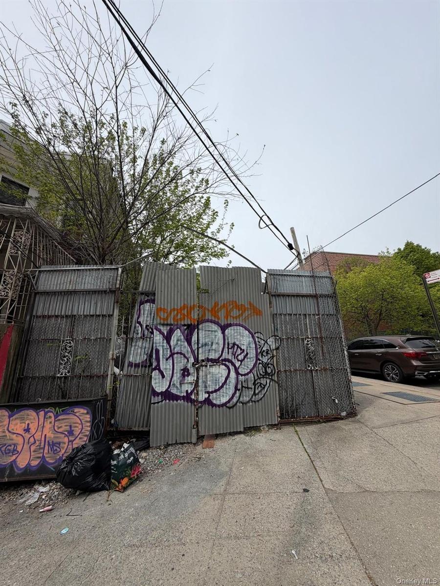 Lot attached to vacant property. Apart of the entire lot. Has construction tools that will be removed at closing.