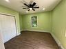 Bedroom #1 2nd floor featuring wood-finish flooring, a black ceiling fan, and recessed lighting