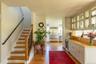 Entrance foyer, with view of the staircase and wet bar