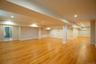 Finished basement with oak floors and full bathroom