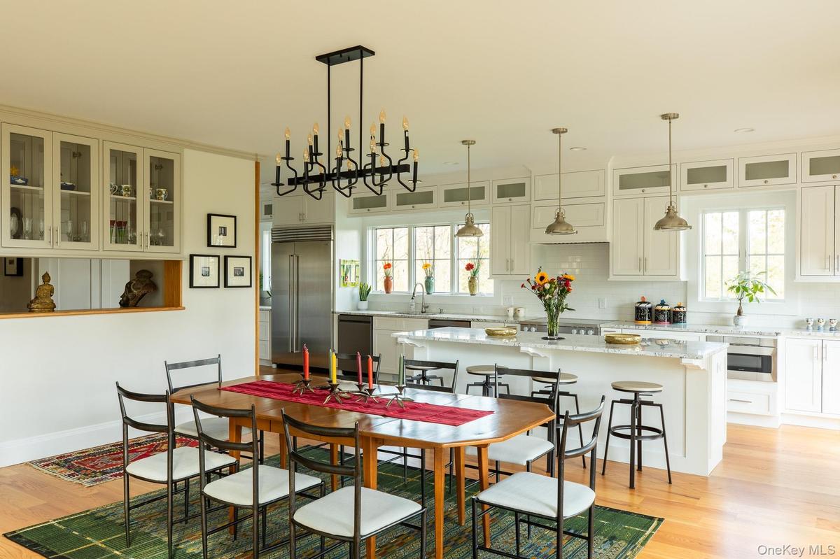 Dining room with a view of the island and kitchen