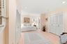 Finished lower level family room/guest quarters with walk-out to parking.