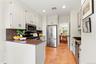 Beautiful hardwood floors and peninsula provides extra counter space.