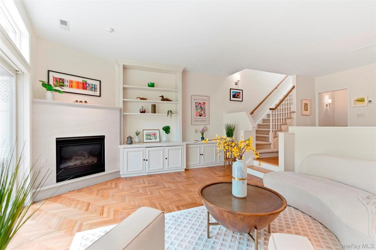 Fireplace and custom built-in cabinetry.