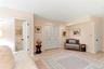 Finished lower level family room/guest quarters with walk-out to parking.