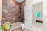 Primary en-suite bath with jetted tub.
