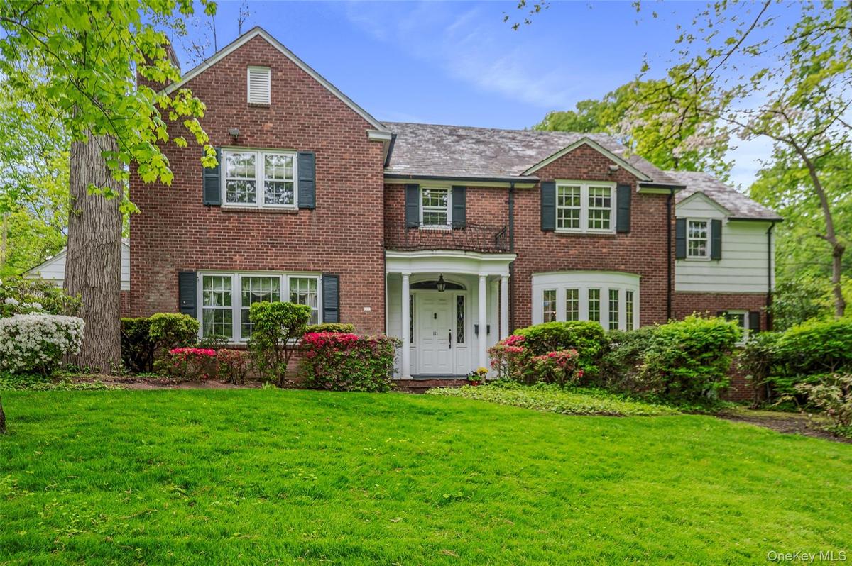 Brick center hall colonial