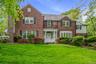 Brick center hall colonial