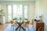 How about an open dining area with a view to the maple forest behind the home for bird watching believe it or not!