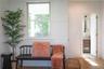 White Oak Floors and oversized windows brings a modern design and natural light to the interior design and how the morning light moves through the hou
