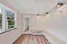 Mudroom with separate entrance to driveway