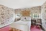 One of Seven Total Bedrooms