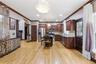 Kitchen featuring wood-finish flooring, recessed lighting, and a central island