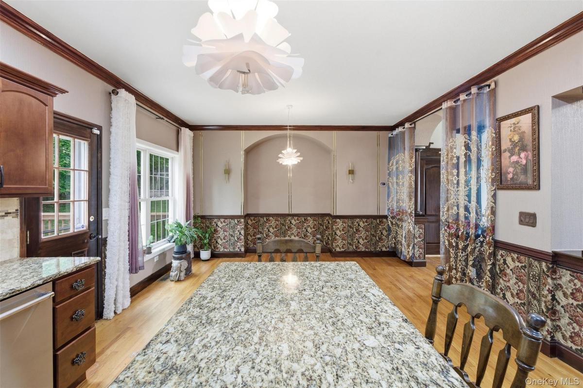 Expansive granite countertop island serving as a central feature