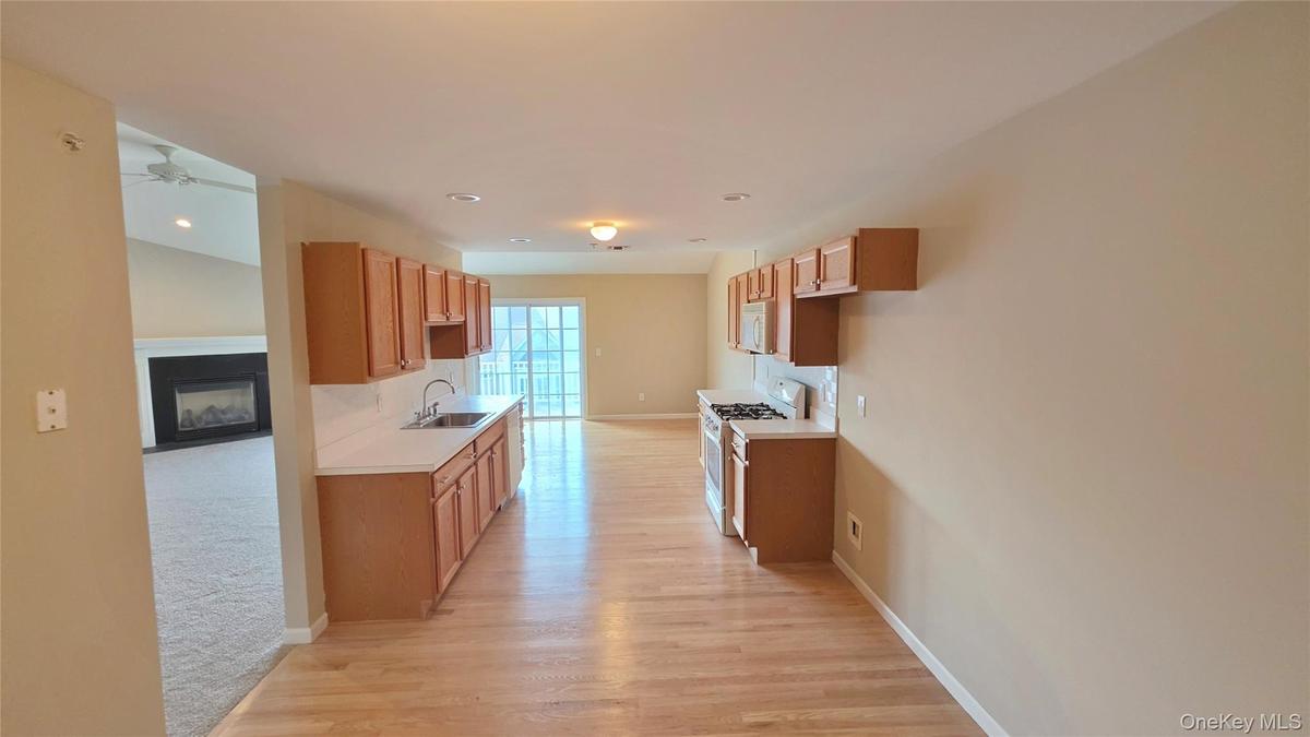 Galley Style eat in kitchen with dinette space.