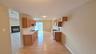 Galley Style eat in kitchen with dinette space.