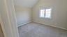 Second bedroom with vaulted ceiling