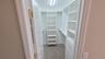 Primary bedroom Walk-In Closet with storage system