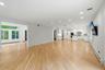 Den and kitchen with formal living room