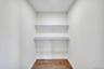 Primary Suite Walk-In Closet