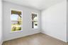Comfortable bedroom with natural light and space to make it your own.