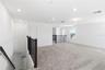 Bright loft area with room to create a media space, play area, homework zone, or lounge.
