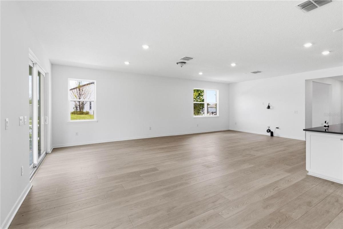 Spacious main level living area ready for quiet evenings, hosting, or everyday comfort.