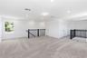 Large upstairs loft with open sightlines and flexible space for a second living area.