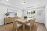 Virtually staged flex room ideal for dining, working, reading, or creative use.